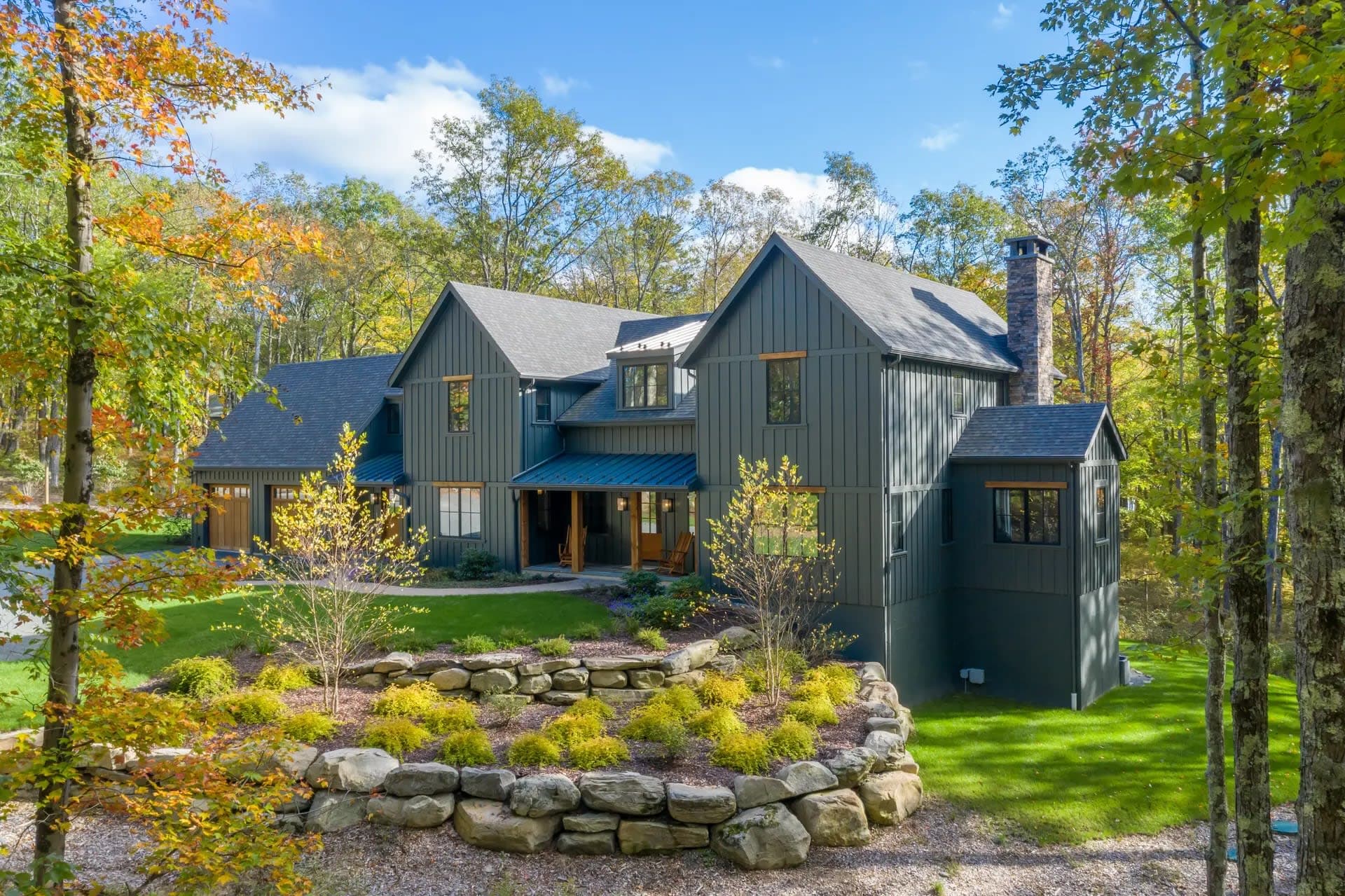 Mountain home with dark blue grey James Hardie siding — NexVue Exteriors Denver